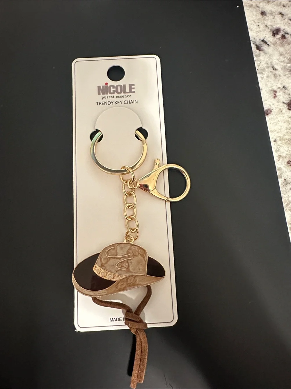Nicole Gold-Tone Western Hat Keychain with Brown Suede Tassel